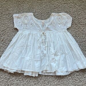 Mirrored tie front pleated Raga blouse